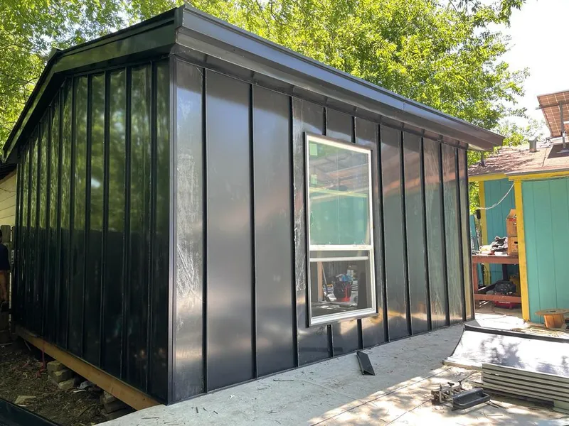 Black standing seam metal wall panels for Metal Roof Installation in Poplar Grove